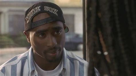 tupac wearing glasses|tupac wearing sox cap.